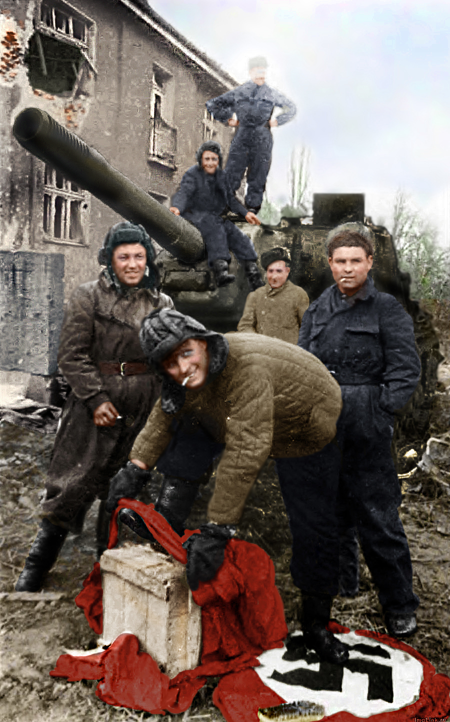 https://klimbim2014.files.wordpress.com/2015/04/lieutenant-tovolzhansky-wipes-his-boots-with-nazi-flag-at-acs-ics-152-deerslayer-on-the-street-of-breslau-1945.jpg